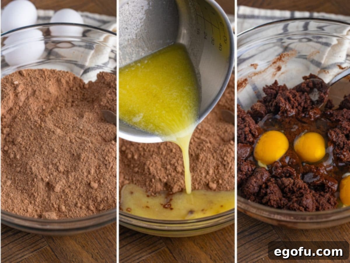 A bowl with brownie mix, butter being poured into brownie mix, and eggs sitting on top of brownie batter.