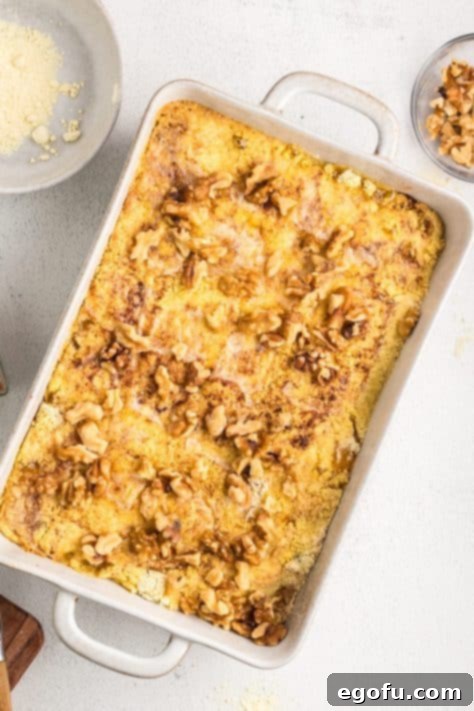 Walnuts on top of a baked Peach Dump Cake.