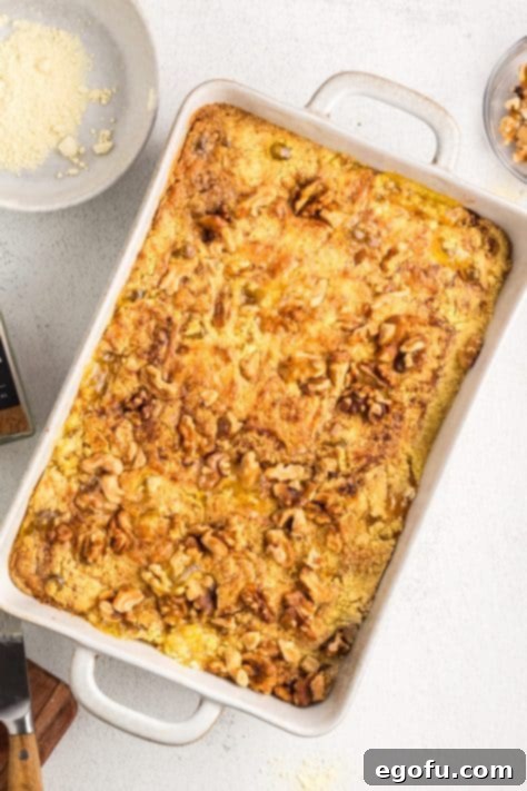 A yummy Peach Dump cake with nuts on top.