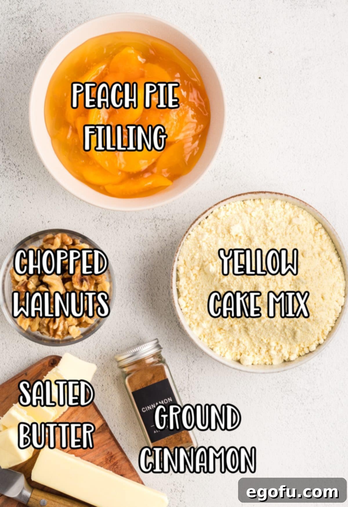 Peach pie filling, chopped walnuts, salted butter, yellow cake mix, and ground cinnamon.