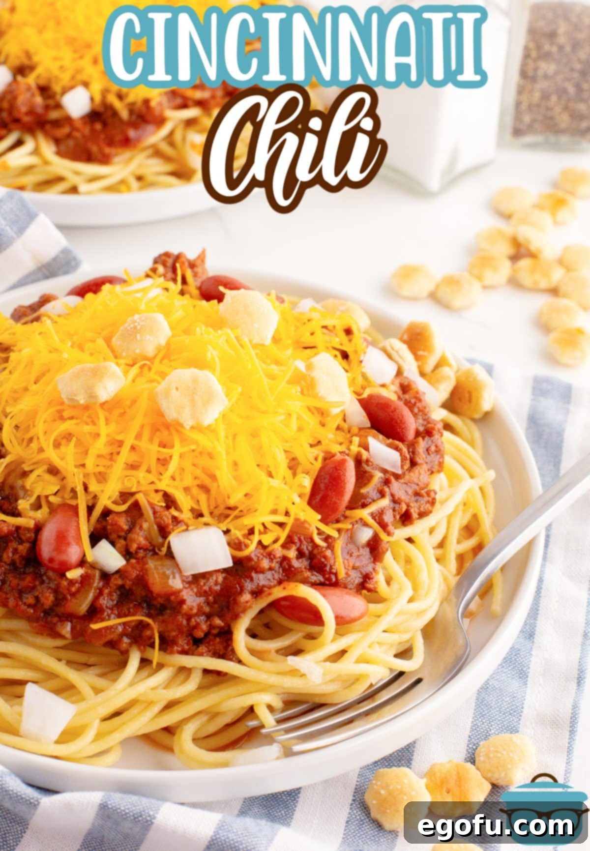 Cincinnati's Signature Chili 3 A bowl of Cincinnati Chili with oyster crackers and cheese.