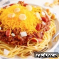 Cincinnati's Signature Chili 9 Close up looking at a serving bowl of Cincinnati Chili on spaghetti.