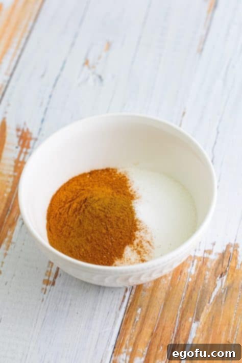 A small bowl of cinnamon and sugar.