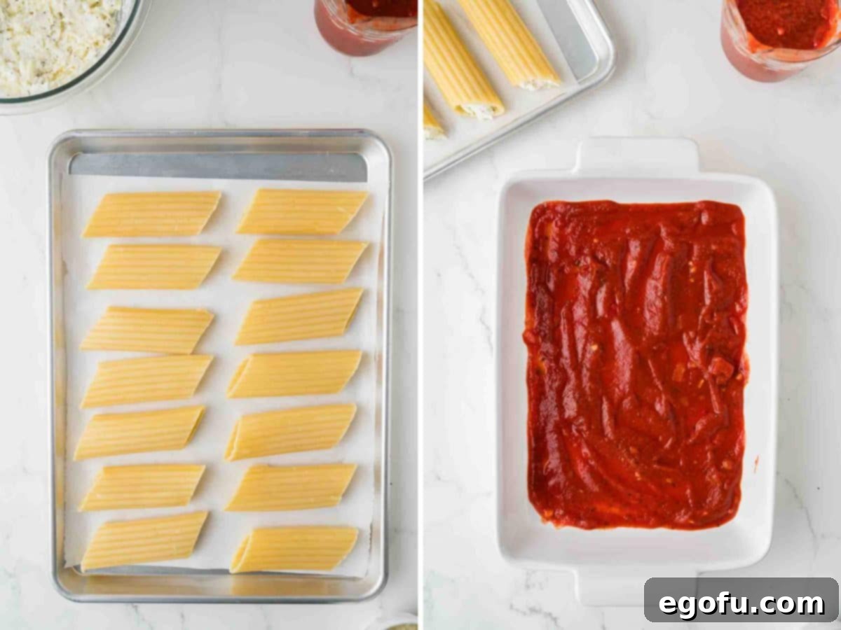 Effortless Manicotti 5 A rectangular baking dish with a base layer of marinara sauce and a separate baking sheet with cooked manicotti shells, ready for filling.