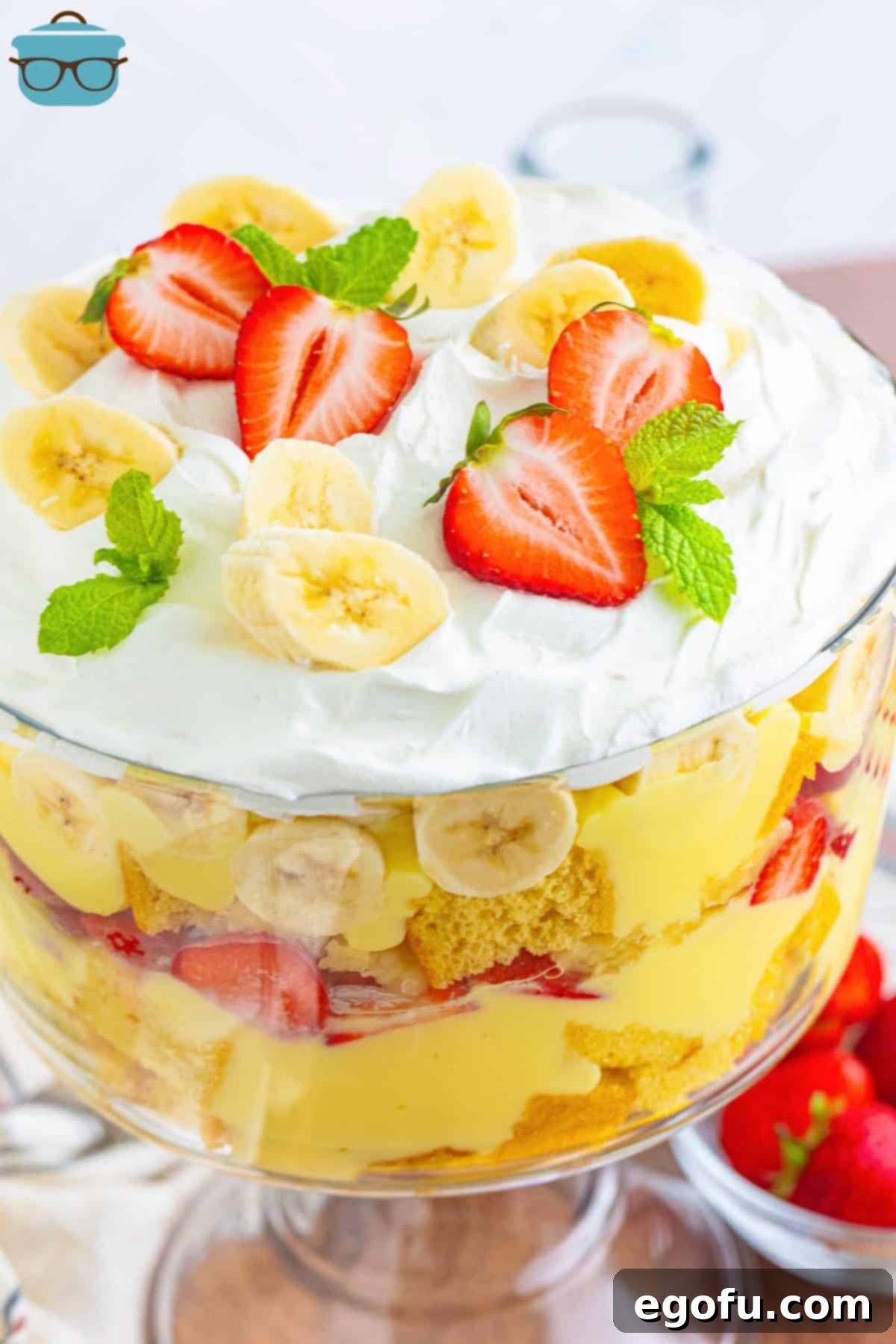 Party Perfect Bowl Cake 2 A beautifully layered Punch Bowl Cake, showcasing cake, pudding, and fruit in a clear glass bowl.