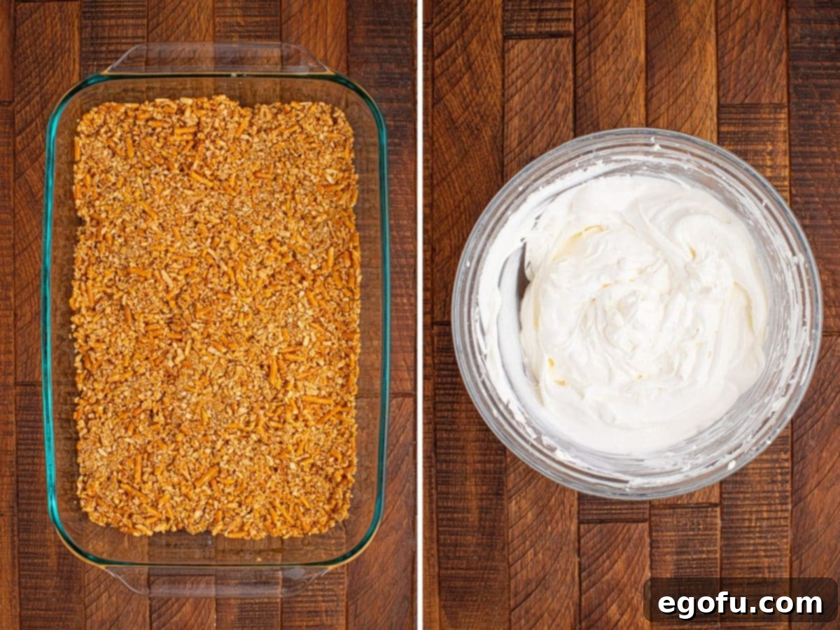 A baking dish with a pretzel layer, ready for the next step.