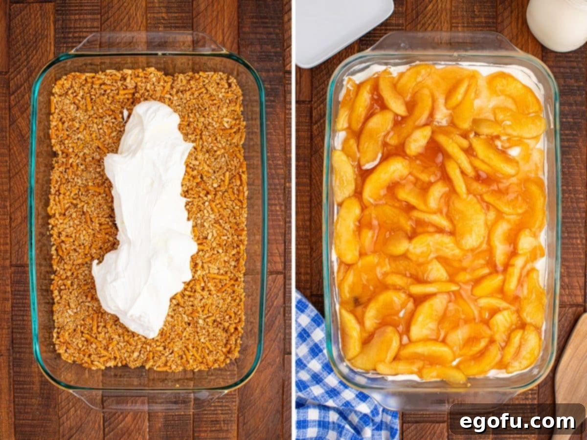 Sweetened cream cheese spread over the pretzel layer, topped with a generous amount of apple pie filling.