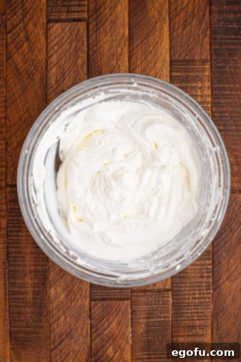 Cool whip, powdered sugar and cream cheese mixed together.