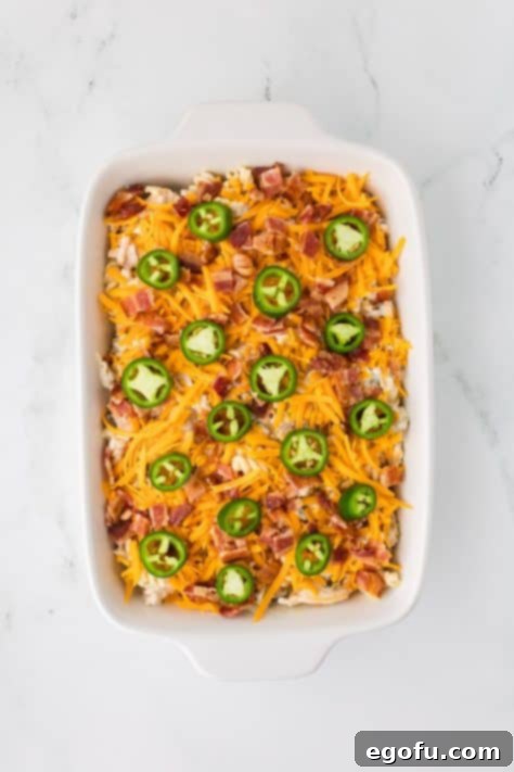 An unbaked casserole in a dish.