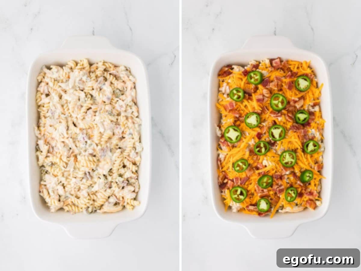 A baking dish with jalapeno popper with chicken casserole filling and one with the filling topped with cheese, bacon, and more jalapenos, ready for the oven.