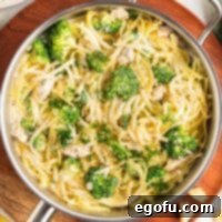 Looking down on a pan of Chicken Broccoli Alfredo.