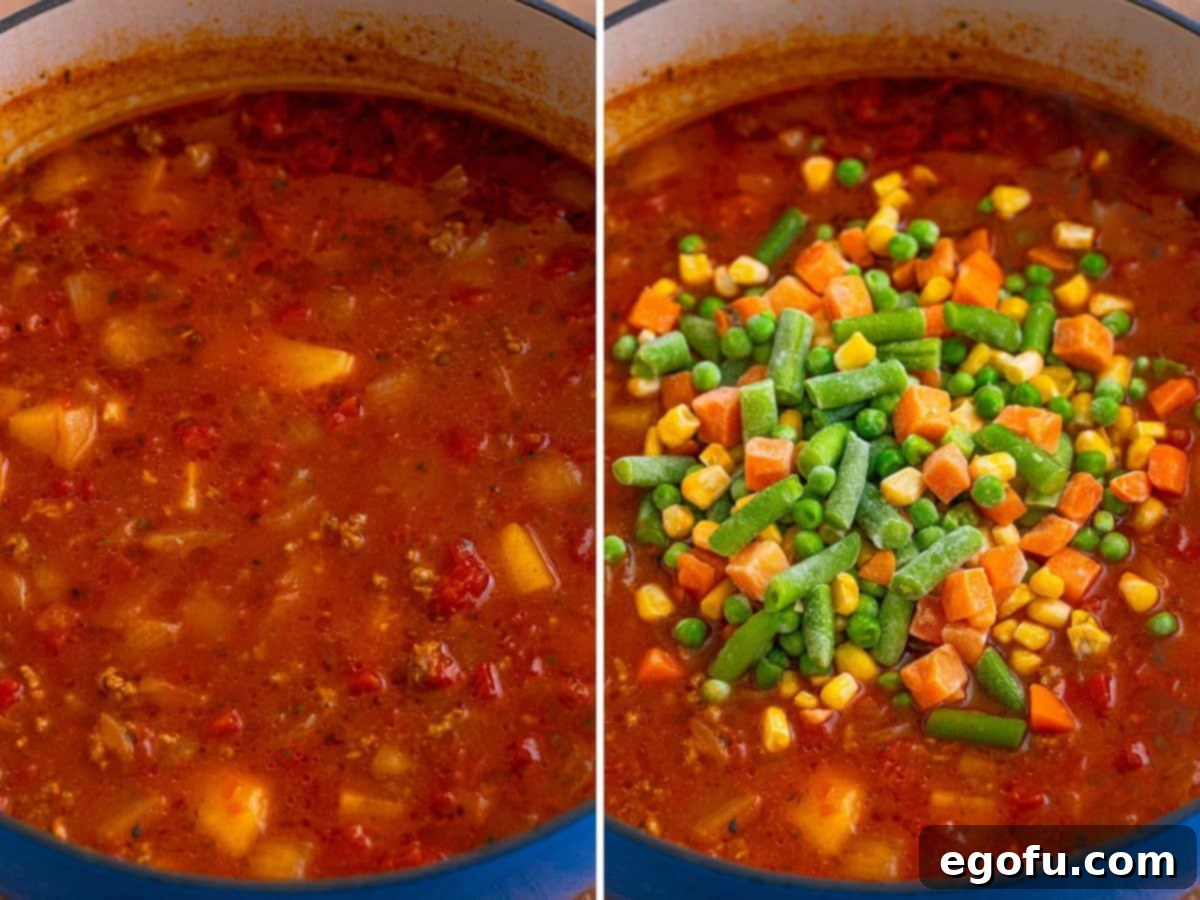 Hamburger soup and a pot with frozen veggies on top of Hamburger soup.