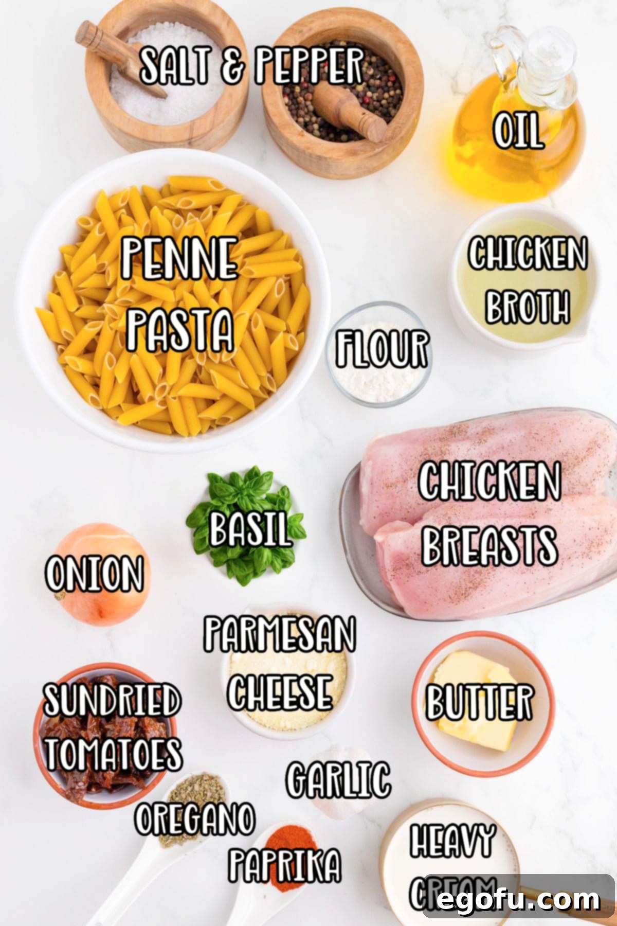 Penne pasta, chicken, salt, pepper, olive oil, butter, onion, garlic cloves, flour, chicken broth, heavy cream, grated parmesan cheese, sun-dried tomatoes, paprika, oregano, and fresh basil.