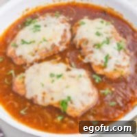 Caramelized Onion Smothered Pork Chops 11 Looking down on a bowl of French Onion Pork Chops.