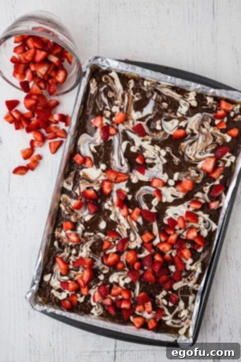 Decadent Strawberry Chocolate Bark 14 Diced strawberries on chocolate and crackers.