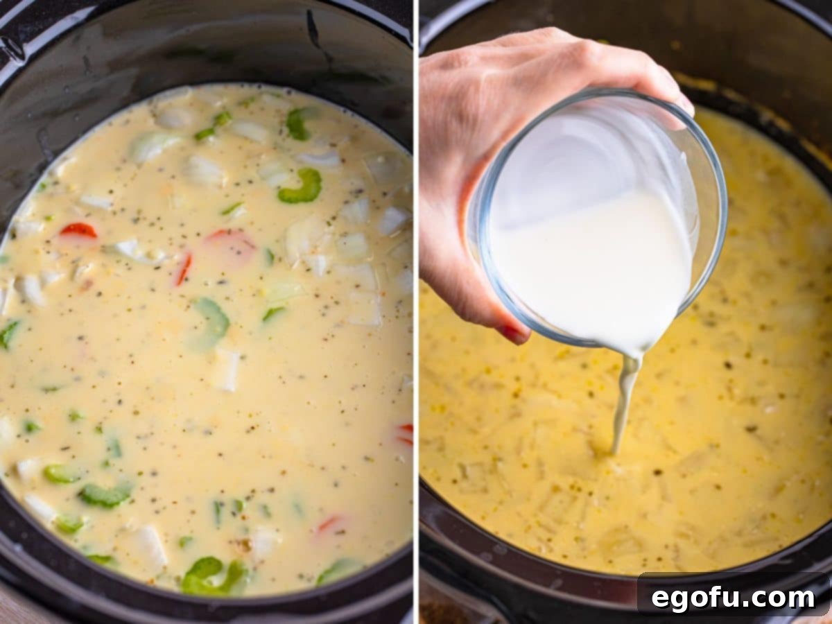 The blended creamy liquid base, containing chicken stock, cream of chicken soup, heavy cream, garlic, and Italian seasoning, being poured into the slow cooker over the chicken and vegetables.