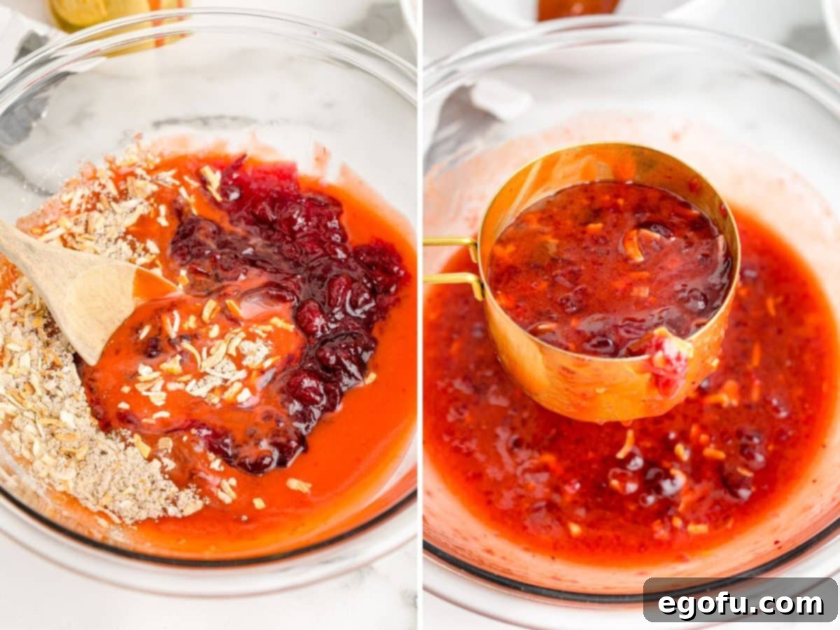 A mixing bowl with basting sauce and a measuring cup removing some sauce.