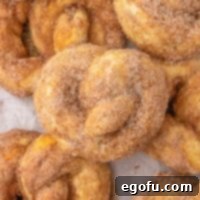 Close up looking at a fresh made Cinnamon Sugar Pretzel.