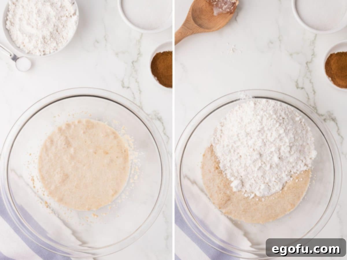 A bowl containing the active yeast, warm milk, and light brown sugar mixture, showing initial activation.