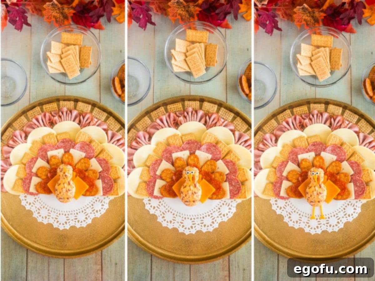 The charcuterie board now features a fully assembled turkey with a cheeseball body, complete with candy eyeballs, a pepperoni gobbler, a cheddar beak, and cheddar legs.
