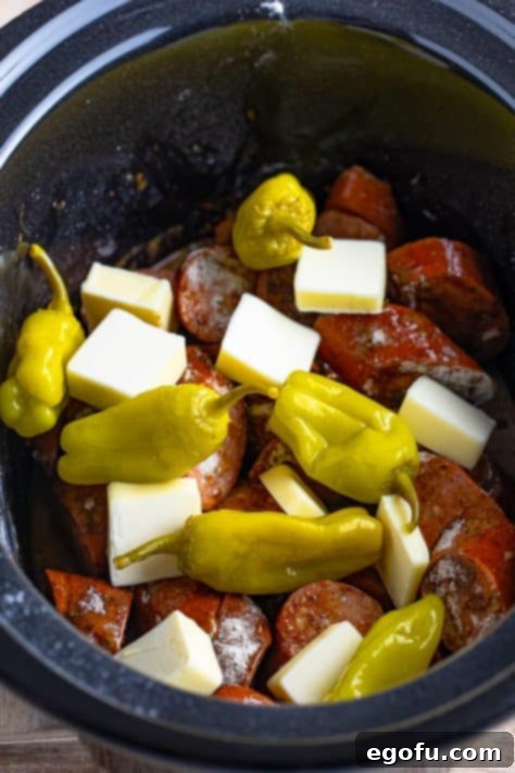 Seasoned kielbasa with butter and peperoncinis.