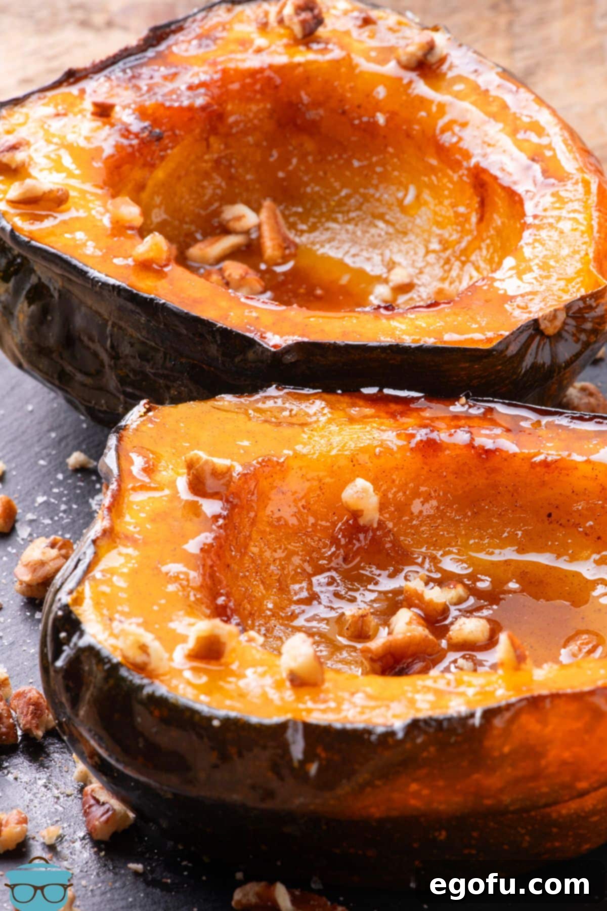 Perfectly Roasted Air Fryer Acorn Squash 2 A pair of sliced Acorn Squash that have been roasted and caramelized in an air fryer, showcasing their golden-brown edges and tender flesh.