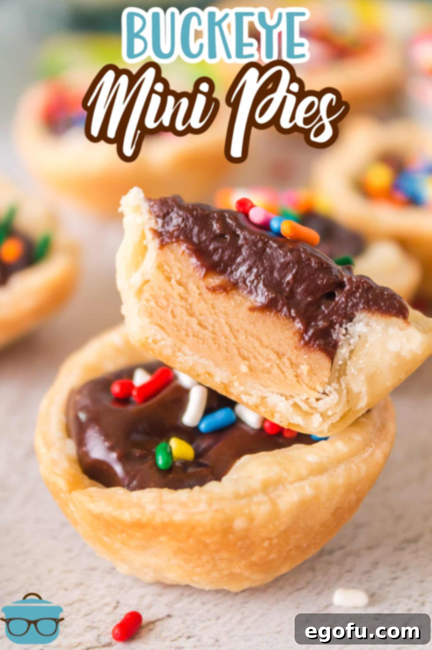 A few homemade Buckeye Mini Pies arranged on a kitchen counter, showcasing their perfect size and inviting appearance.