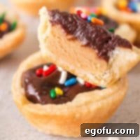 Close-up of a whole and half Buckeye Mini Pie stacked together, showcasing the layers.