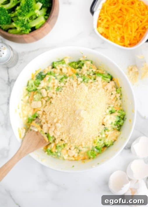 Homestyle Broccoli Cheddar Cornbread 14 Cornbread mix being added to wet ingredients.