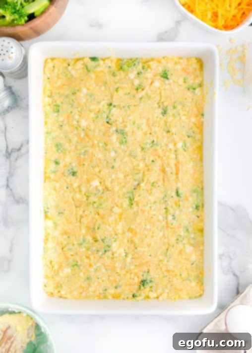 Homestyle Broccoli Cheddar Cornbread 15 Cornbread batter in a baking dish.