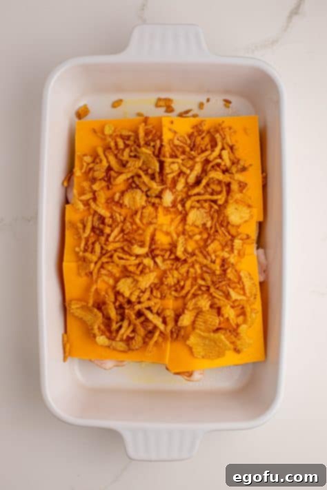 Zesty BBQ Chicken Sliders 12 Fried onions on top of cheese, chicken and bread.