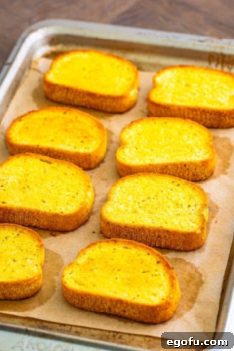 Baked Texas Toast on a lined baking sheet until golden brown.
