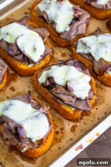 Perfectly melted cheese on top of roast beef and Texas Toast after baking.