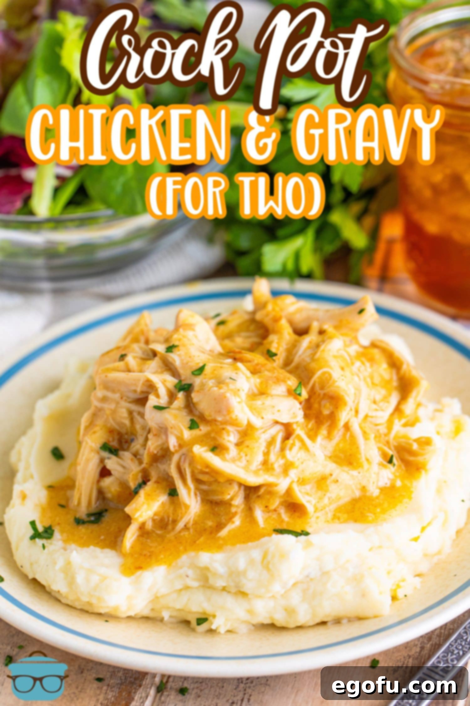 Date Night Slow Cooker Chicken and Gravy 3 A plate of mashed potatoes with a large scoop of Crock Pot Chicken and Gravy.