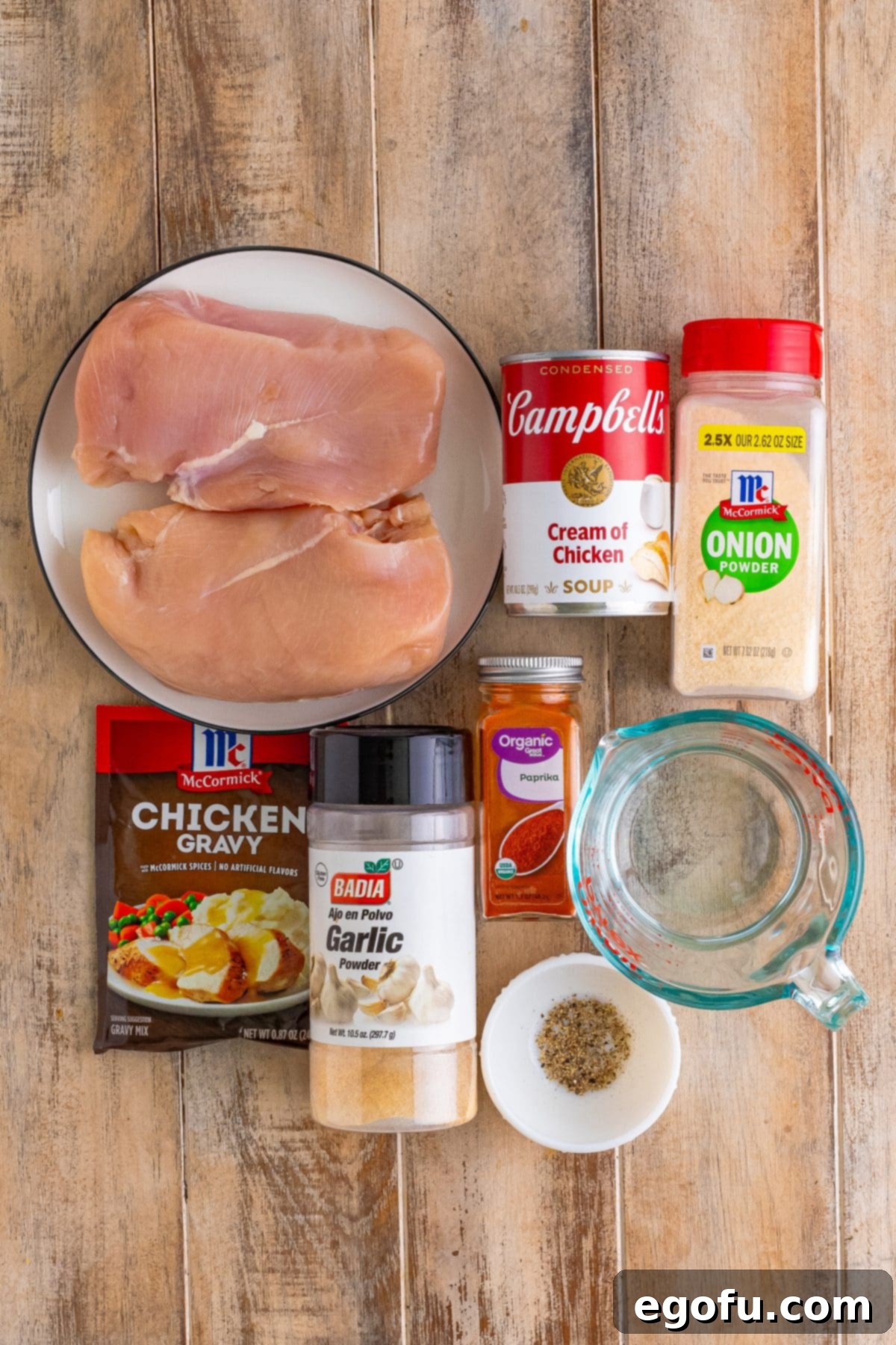 Date Night Slow Cooker Chicken and Gravy 4 Chicken breasts, garlic powder, onion powder, paprika, black pepper, condensed cream of chicken soup, water, and chicken gravy mix.