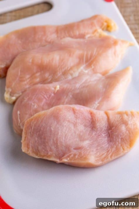 California Stuffed Chicken 14 Sliced chicken breasts on a plate.