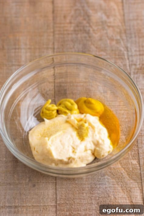 California Stuffed Chicken 21 A bowl with dipping sauce ingredients waiting to be mixed.