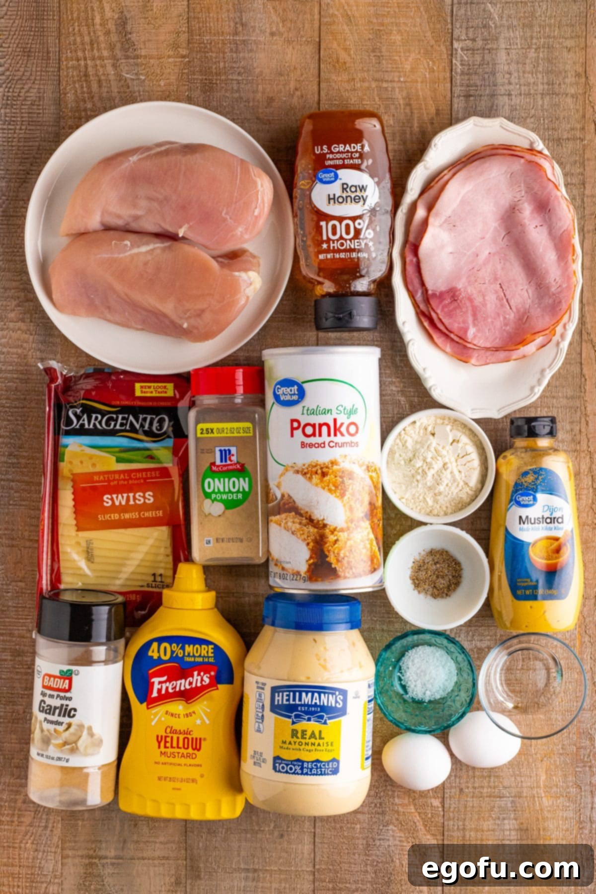 California Stuffed Chicken 4 Chicken breasts, eggs, mayo, yellow mustard, Dijon mustard, Panko breadcrumbs, deli ham, garlic powder, onion powder, honey, Swiss cheese, flour, salt, and pepper.
