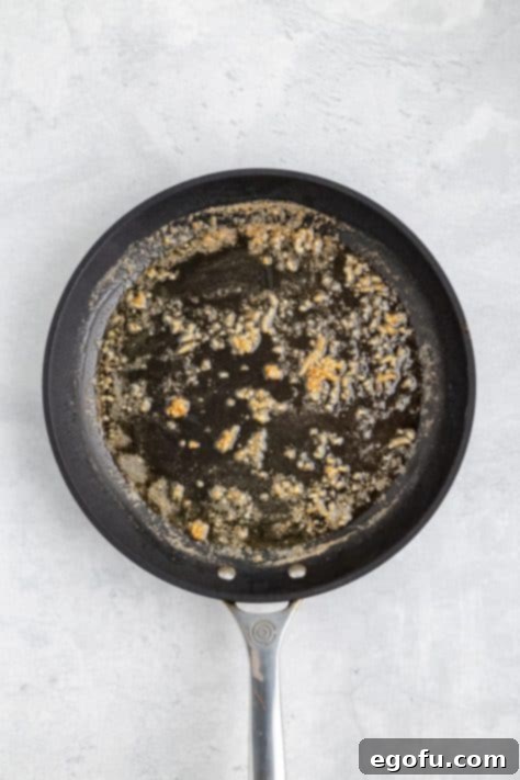 Butter and garlic in a skillet.