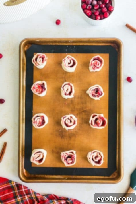 Cut unbaked pinwheels.