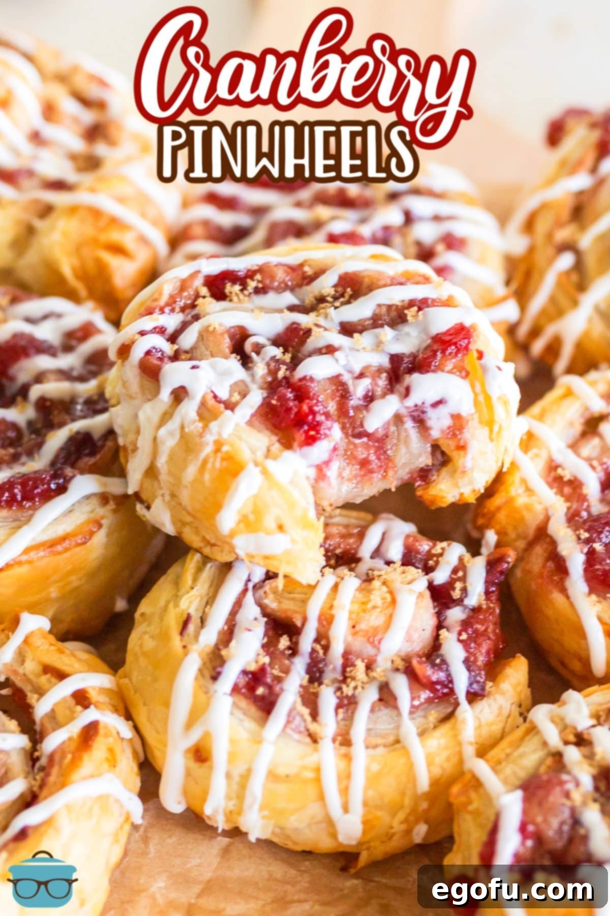 A few freshly baked Cranberry Pinwheels arranged artfully on a serving dish.