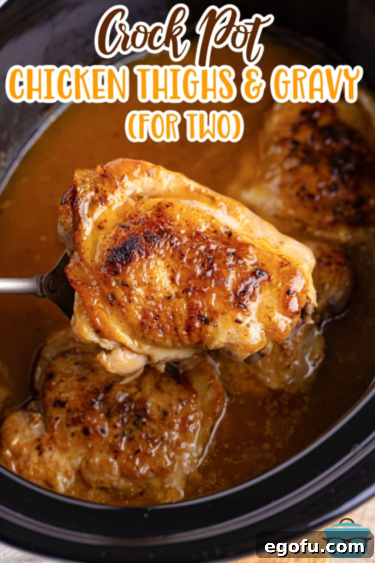 A Slow Cooker filled with rich gravy, and a serving spoon carefully lifting a perfectly tender Chicken Thigh, showcasing its succulent texture above the pot.