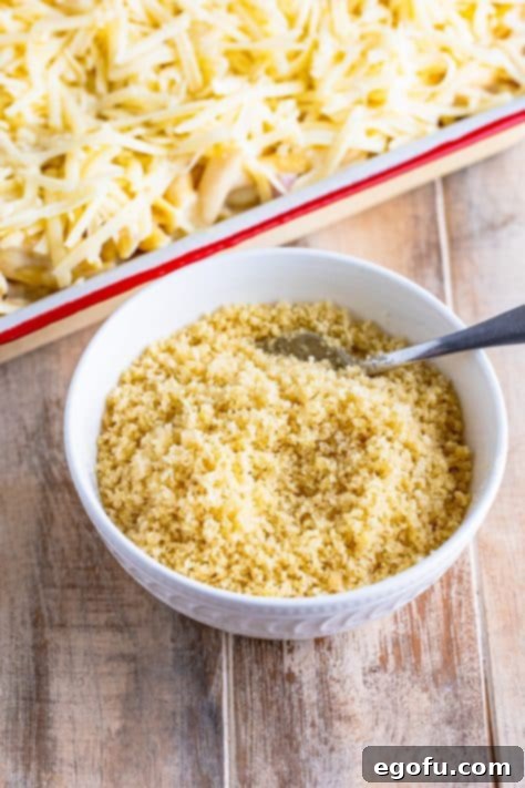 Breadcrumbs and melted butter in a bowl.