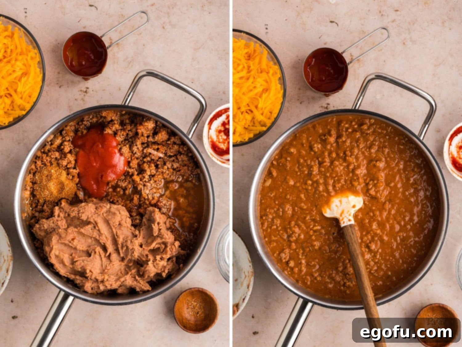 A skillet filled with a simmering mixture of ground beef, onions, refried beans, water, tomato sauce, and taco seasoning, being stirred with a spatula.