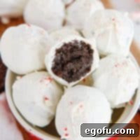 A few Oreo Balls in a pile with one bit in half.