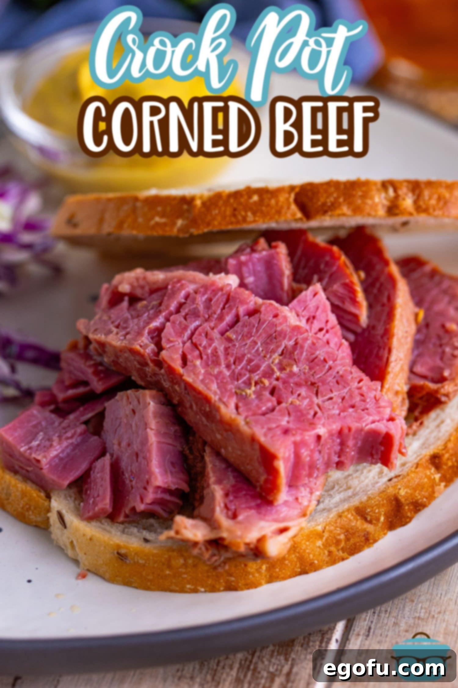 Set-It-and-Forget-It Corned Beef 3 Close-up of several succulent slices of corned beef arranged on bread, ready for a delicious sandwich.