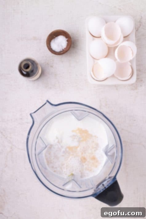 All ingredients for the banana custard in a blender, ready to be mixed.