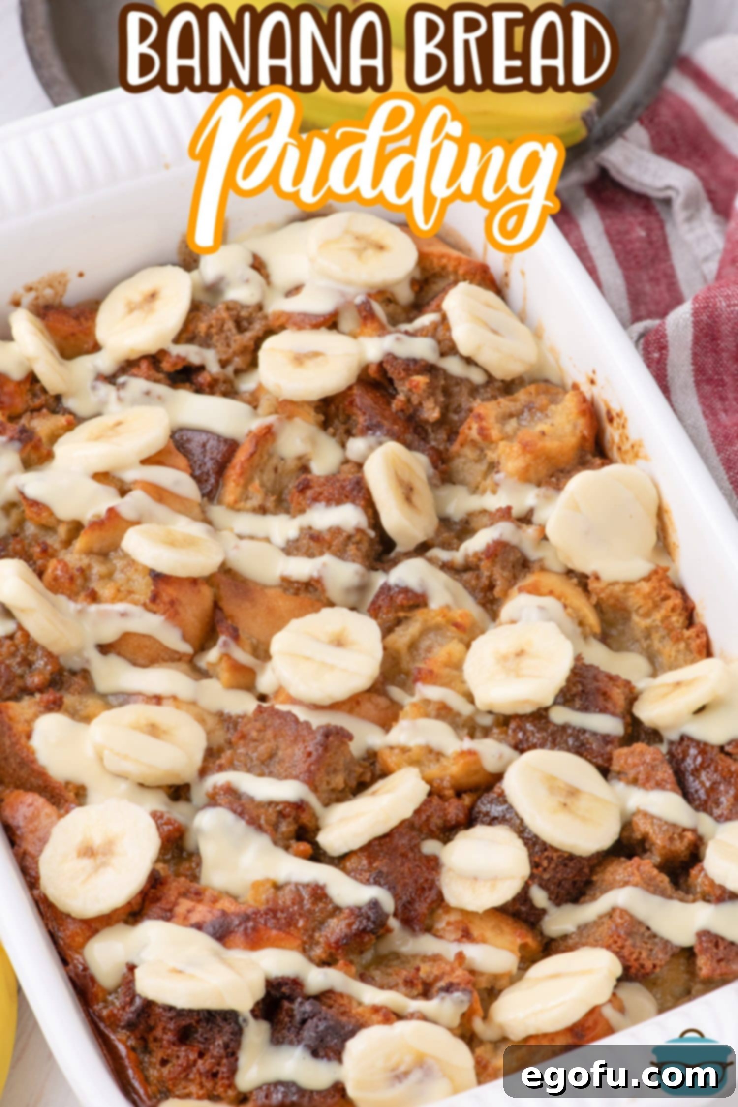 A baking dish filled with golden brown Banana Bread pudding, fresh from the oven.
