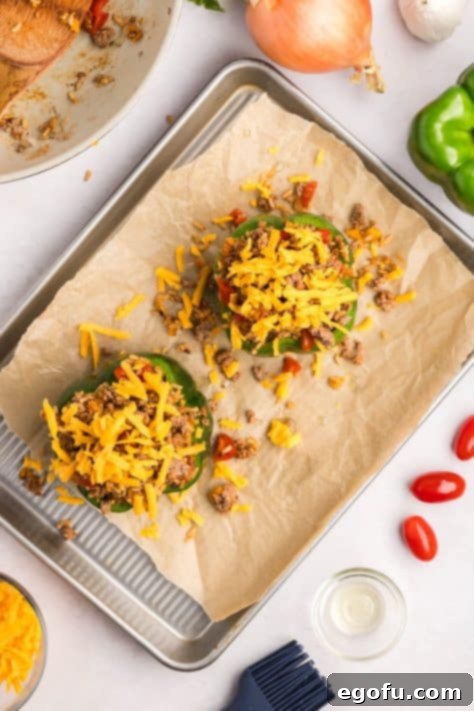 Cheese added to stuffed peppers.