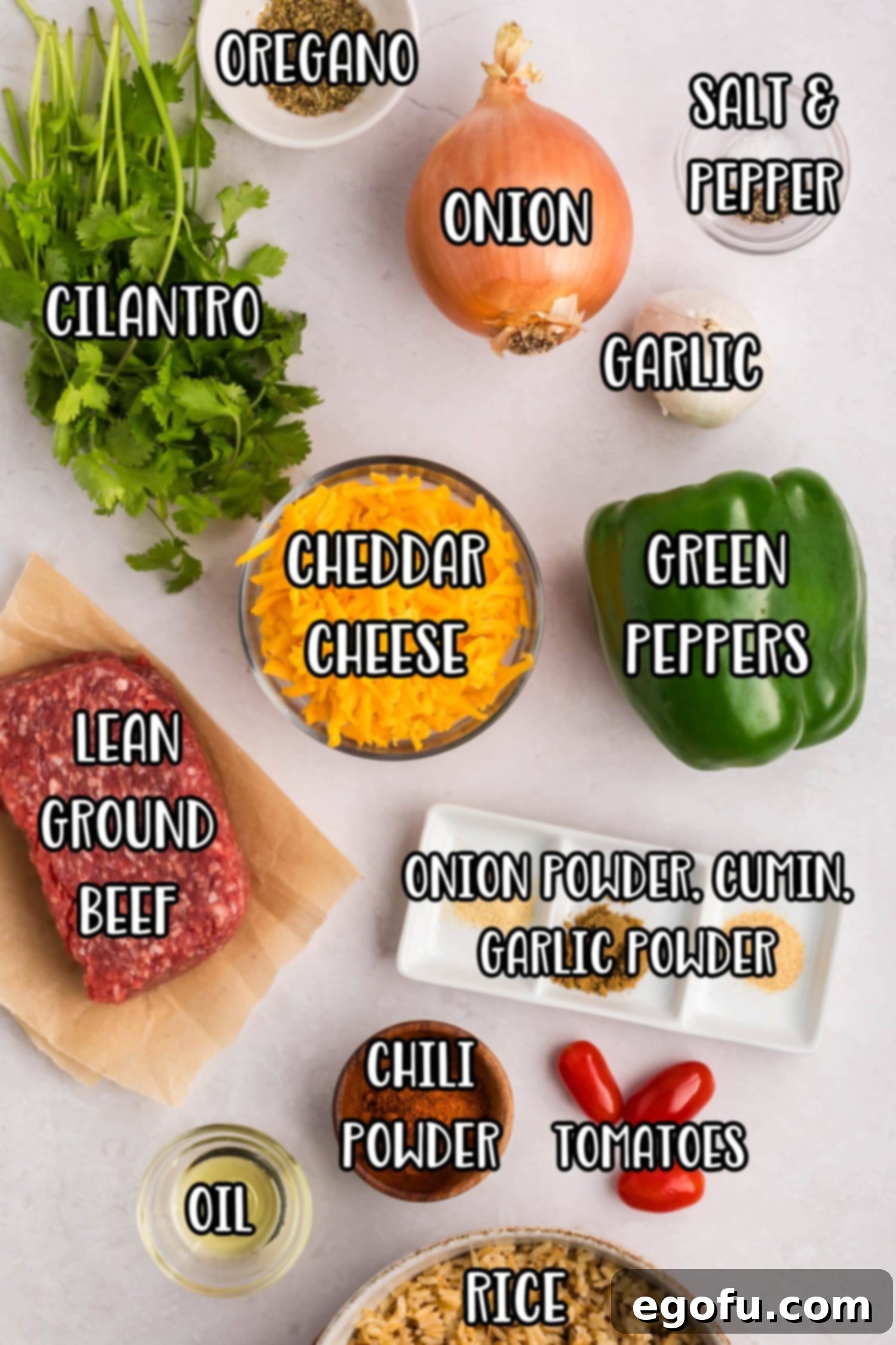 Cilantro, oregano, onion, garlic, salt, pepper, cheddar cheese, green bell pepper, lean ground beef, onion powder, cumin, garlic powder, chili powder, tomato, oil, and rice.